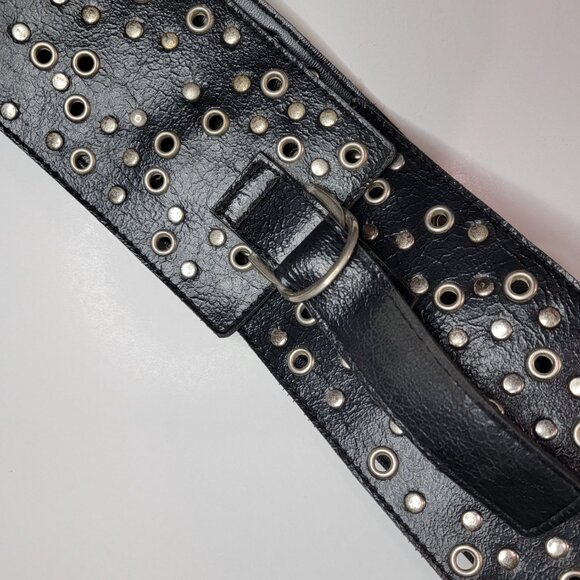 Black Wide Faux Leather Belt Embellished with Silver Toned Eyelet Grommets - Picture 3 of 3